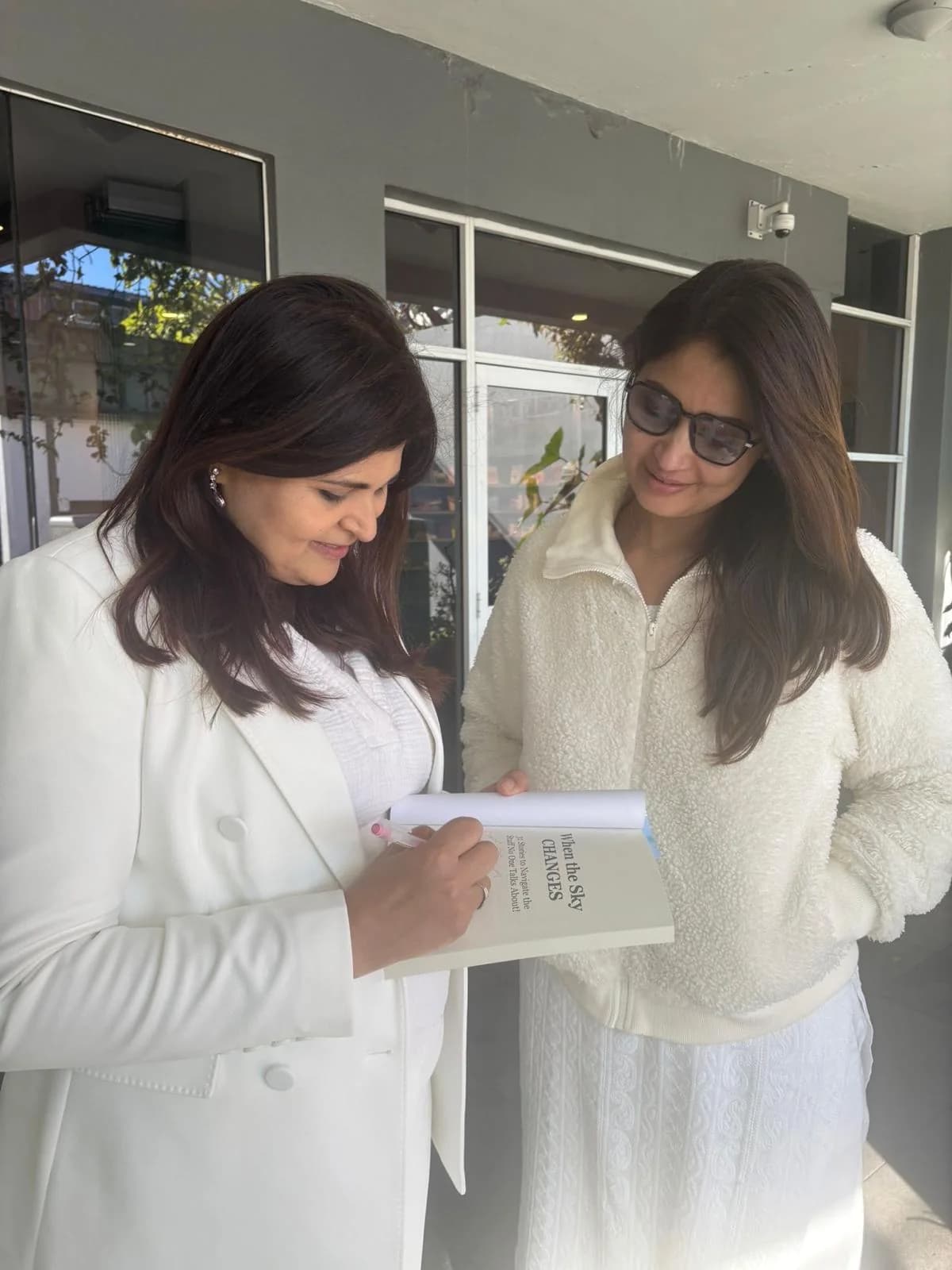 Signing a copy of When the Sky Changes